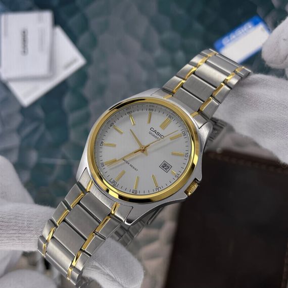 Чоловічий годинник Casio MTP-1183G-7A | Зображення 1