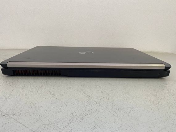 Мобильная рабочая станция Fujitsu Celsius H730 / 15.6" (1920x1080) IPS / Intel Core i7-4800MQ (4 (8) ядра по 2.7 - 3.7 GHz) / 16 GB DDR3 / 128 GB SSD / nVidia Quadro K1100M, 2 GB GDDR5, 128-bit / WebCam / DVD-ROM б/у | Зображення 4
