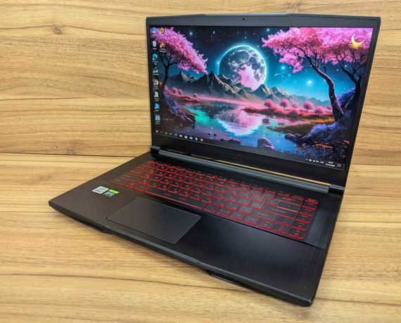 Игровой ноутбук MSI GF65 Thin 10uE / 15.6" (1920x1080) IPS / Intel Core i7-10750H (6 (12) ядер по 2.6 - 5.0 GHz) / 16 GB DDR4 / 512 GB SSD / nVidia GeForce RTX 3060, 6 GB GDDR6, 192-bit / WebCam / Windows 10 б/у + Подарок Беспроводная мышь / USB | Зображення 4