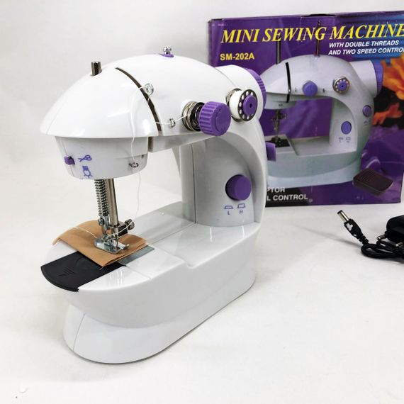 Мини швейная машинка FHSM 202 4 в 1 с педалью и подсветкой + адаптер 220V, Швейная машина для детей | Зображення 4