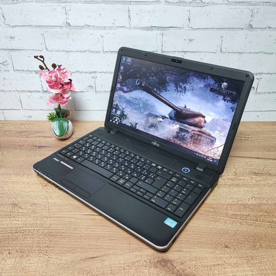 Ноутбук Б-класс Fujitsu LifeBook A512 / 15.6" (1366x768) TN / Intel Core i3-3110M (2 (4) ядра по 2.4 GHz) / 8 GB DDR3 / 120 GB SSD / Intel HD Graphics 4000 / WebCam / DVD-ROM / VGA б/у | Зображення 2