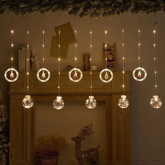 Гірлянда штора 3м з теплим жовтим світінням "Круги та кулі" ялинка, сніговик, дід мороз, олень, шапка SF-50