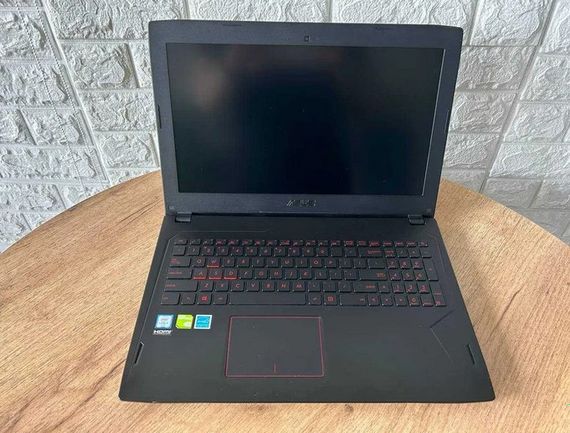 Ноутбук Asus FX502VML 15,6" FHD i5 6300HQ 16Gb SSD 256Gb+HDD 1Tb GTX 1060 Б/У | Зображення 5