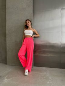 Женские яркие спортивные штаны-палаццо оверсайз SH400 цвет неоновый розовый, размер onesize 42/46