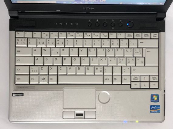 Ноутбук Fujitsu LifeBook S761 / 13.3" (1366x768) TN / Intel Core i5-2520M (2 (4) ядра по 2.5 - 3.2 GHz) / 8 GB DDR3 / 250 GB HDD / Intel HD Graphics 3000 / WebCam / DVD-ROM б/в | Зображення 7