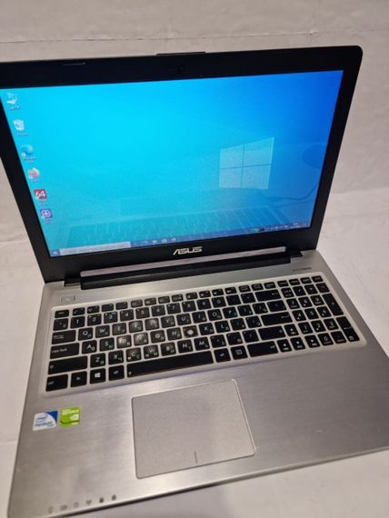 Ноутбук Б-класс Asus K56CB / 15.6" (1366x768) TN / Intel Pentium 2117U (2 ядра по 1.8 GHz) / 8 GB DDR3 / 240 GB SSD / nVidia GeForce GT 740M, 2 GB DDR3, 64-bit / WebCam / DVD-RW б/у | Зображення 1