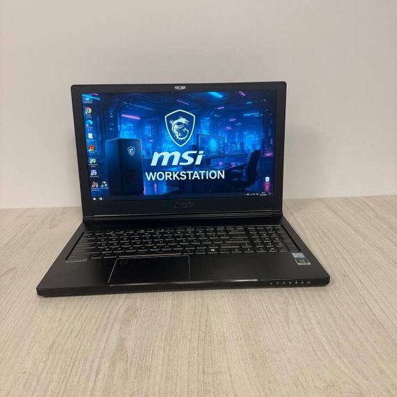 Мобильная рабочая станция MSI WS63 7RK / 15.6" (1920x1080) IPS / Intel Core i7-7920HQ (4 (8) ядра по 3.1 - 4.1 GHz) / 16 GB DDR4 / 512 GB SSD / nVidia Quadro P3000, 6 GB GDDR5, 192-bit / WebCam б/у | Зображення 1