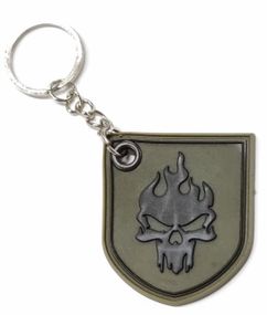 Брелок резиновый с кольцом  "Вогнений череп" хаки-черный