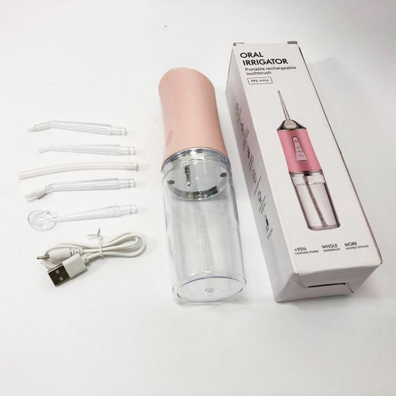 Ирригатор для чистки зубов и полости рта Oral Irrigator с аккумулятором и сменными насадками. Цвет: розовый | Зображення 6