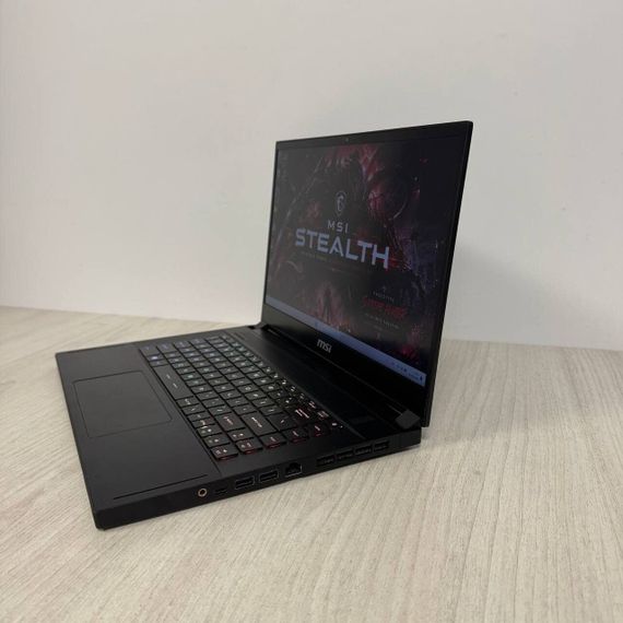 Игровой ноутбук Б-класс MSI GS66 Stealth 11UH / 15.6" (1920x1080) IPS / Intel Core i9-11900H (8 (16) ядер по 2.5 - 4.9 GHz) / 16 GB DDR4 / 512 GB SSD / nVidia GeForce RTX 3080, 16 GB GDDR6, 256-bit / WebCam б/у | Зображення 3