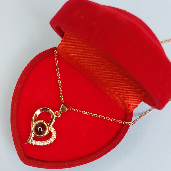 Кулон Сердце с проецирующей линзой "я тебя люблю на 100 языках мира" в коробке сердце.