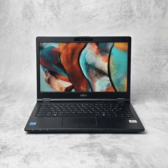 Ноутбук Fujitsu LifeBook E5411 / 14" (1920x1080) IPS / Intel Core i3-1115G4 (2 (4) ядра по 1.7 - 4.1 GHz) / 16 GB DDR4 / 256 GB SSD M.2 / Intel UHD Graphics / WebCam / Win 10 Pro б/у | Зображення 1