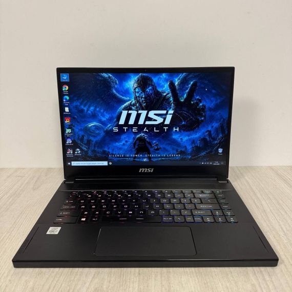 Ігровий ноутбук Б-клас MSI GS66 Stealth 10SE / 15.6" (1920x1080) IPS / Intel Core i7-10750H (6 (12) ядра по 2.6 - 5.0 GHz) / 16 GB DDR4 / 512 GB SSD / nVidia GeForce RTX 2060, 6 GB GDDR6, 192-bit / WebCam б/в | Зображення 1