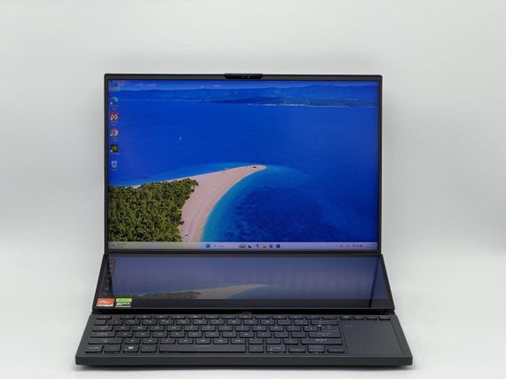 Ігровий ноутбук Б-клас Asus ROG Zephyrus Duo GX650PY / 16" (2560x1600) OLED Touch / AMD Ryzen 9 7945HX (16 (32) ядер по 2.5 - 5.4 GHz) / 32 GB DDR5 / 960 GB SSD / nVidia GeForce RTX 4090, 16 GB GDDR6, 256-bit / WebCam б/в | Зображення 1