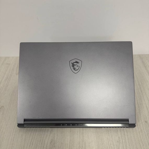 Ігровий ноутбук Б-клас MSI Creator 16 AI Studio A1VHG / 16" (3840x2400) IPS / Intel Core Ultra 9 185H (16 (22) ядер по 3.9 - 5.1 GHz) / 16 GB DDR5 / 1000 GB SSD NVMe / nVidia GeForce RTX 4080, 12 GB GDDR6, 192-bit / WebCam б/в | Зображення 7