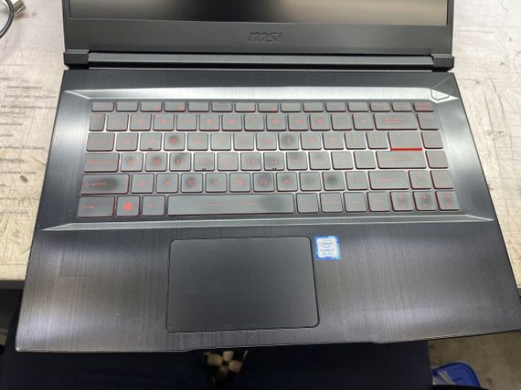 Игровой ноутбук Б-класс MSI GF63 8RD-222US / 15.6" (1920x1080) IPS / Intel Core i7-8750H (6 (12) ядер по 2.2 - 4.1 GHz) / 16 GB DDR4 / 480 GB SSD / nVidia GeForce GTX 1050 Ti MaxQ, 4 GB GDDR5, 128-bit / WebCam б/у + Подарок Беспроводная мышь HOCO GM28 | Зображення 5