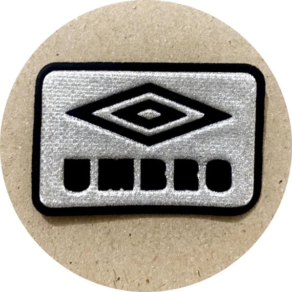 Нашивка на одяг (термо) Umbro 2 49*32 мм Срібляста