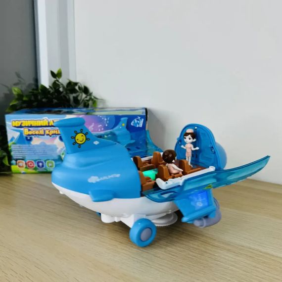 Игрушечный музыкальный самолет с пассажирами, двигается, вращается 360  Airliner Light Music 8811-16 | Зображення 4