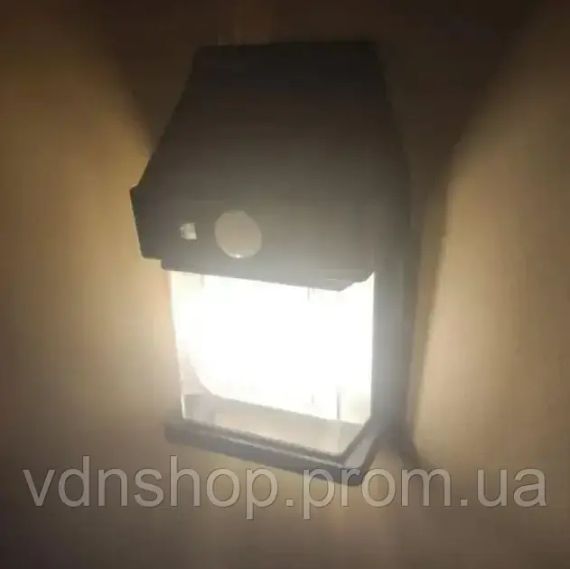 Настінний вуличний світильник із сонячною панеллю, ліхтар із датчиком на рух SOLAR WALL LAMP YX-777 Black | Зображення 1