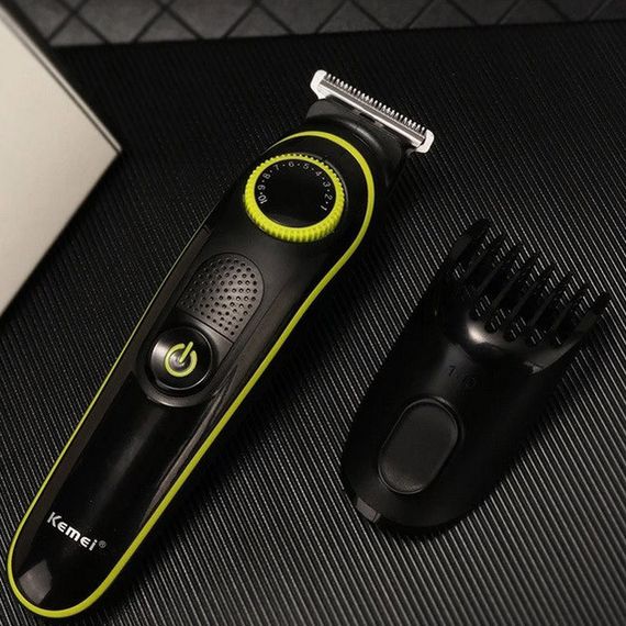 Багатофункціональна бритва Kemei KM-696: акумуляторний триммер з насадками для бороди та волосся. | Зображення 4