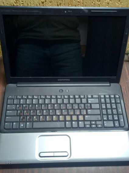 Ноутбук HP Compaq Presario CQ60 / 15.6" (1366x768) TN / Intel Celeron 585 (1 ядро з 2.16 GHz) / 4 GB DDR2 / 250 GB HDD / Intel GMA 4500M Graphics / WebCam / DVD-ROM / Windows 7 / АКБ не тримає б/в | Зображення 1