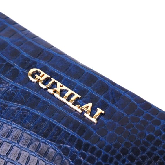 Кошелек женский кожаный с тиснением под экзотику Guxilai 18963 Синий | Зображення 5