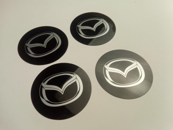 Емблема MAZDA на ковпак SJS (Туреччина) (к-т 4 шт.) продається тільки з ковпаками