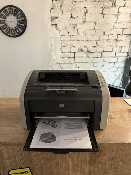Принтер HP LaserJet 1010 / лазерний монохромний друк / 600x600 dpi / A4 / 12 стор. хв / USB 2.0 б/в | Зображення 1