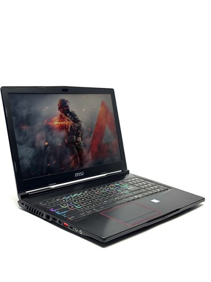 Ігровий ноутбук Б-клас MSI Raider GE63VR / 15.6" (1920x1080) TN / Intel Core i7-7700HQ (4 (8) ядра по 2.8 - 3.8 GHz) / 16 GB DDR4 / 256 GB SSD / nVidia GeForce GTX 1070, 8 GB GDDR5, 256-bit / WebCam / Win 10 Pro б/в | Зображення 3
