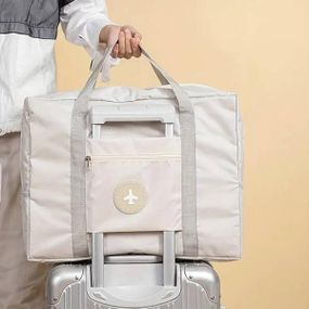 Вместительная дорожная сумка для путешествий с боковыми карманами Серая