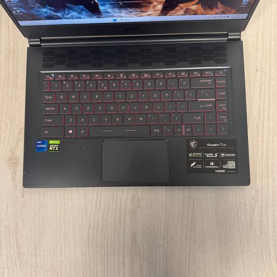 Игровой ноутбук Б-класс MSI Stealth 15M A11UEKV / 15.6" (1920x1080) IPS / Intel Core i7-11375H (4 (8) ядра по 3.0 - 5.0 GHz) / 16 GB DDR4 / 512 GB SSD NVMe / nVidia GeForce RTX 3060, 6 GB GDDR6, 192-bit / WebCam б/у | Зображення 2