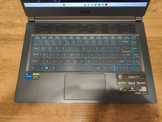 Игровой ноутбук MSI Stealth 15M A11UEKV / 15.6" (1920x1080) IPS / Intel Core i7-11375H (4 (8) ядра по 3.0 - 5.0 GHz) / 16 GB DDR4 / 512 GB SSD / nVidia GeForce RTX 3060, 6 GB GDDR6, 192-bit / WebCam / Windows 10 Home б/у | Зображення 2