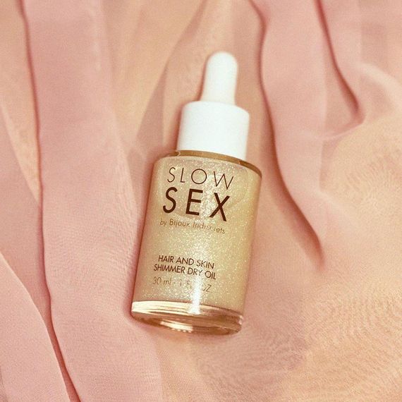 Сухое масло для тела и волос Slow Sex by Bijoux Indiscrets с мерцающими частичками sexstyle | Зображення 17