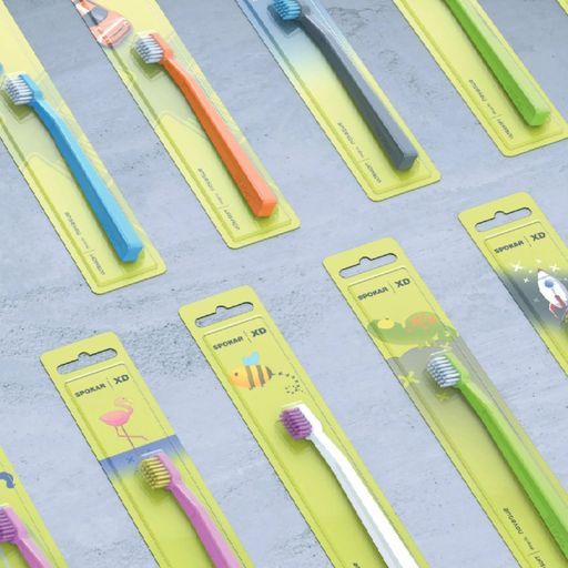 Дитяча зубна щітка Spokar XD UltraSoft (ультра-м'яка) від 6 ти до 12 років, діаметр щетинок 0,10мм., синя з білим | Зображення 1