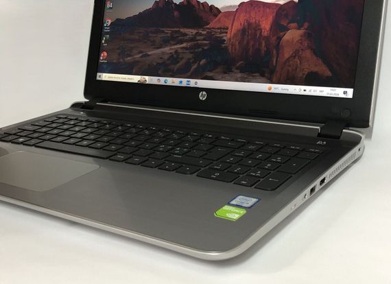 Ноутбук HP Pavilion 15 / 15.6" (1920x1080) TN / Intel Core i5-6200U (2 (4) ядра по 2.3 - 2.8 GHz) / 8 GB DDR3 / 256 GB SSD / GeForce 940M, 2 GB DDR3, 64-bit / WebCam / Win 10 Home б/в + Подарунок Флешка Kingston 64GB | Зображення 8