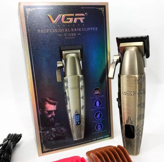 Машинка для стрижки волос VGR V-036 роторная на аккумуляторе с нержавеющей стали 8 насадок 8 Вт Золотистая | Зображення 6