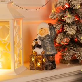 Новорічна декоративна фігурка з підсвіткою 9×10×19 см Новорічний декор Дівчинка з подарунком з порцеляни CR-5-18