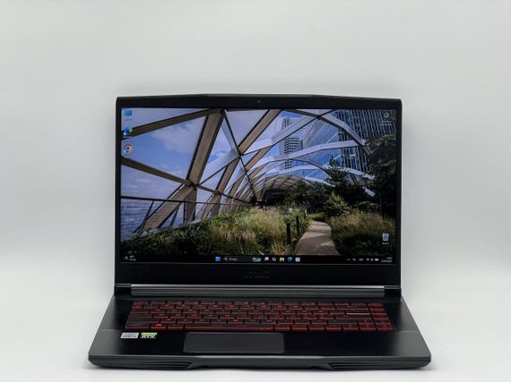 Игровой ноутбук Б-класс MSI GF65 Thin 10SDR / 15.6" (1920x1080) IPS / Intel Core i5-10300H (4 (8) ядра по 2.5 - 4.5 GHz) / 16 GB DDR4 / 480 GB SSD / nVidia GeForce GTX 1660 Ti, 6 GB GDDR6, 192-bit / WebCam б/у + Подарок Беспроводная мышь HOCO GM28 | Зображення 1