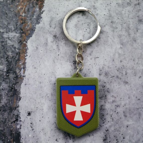 Брелок резиновый 104 ОБрТрО