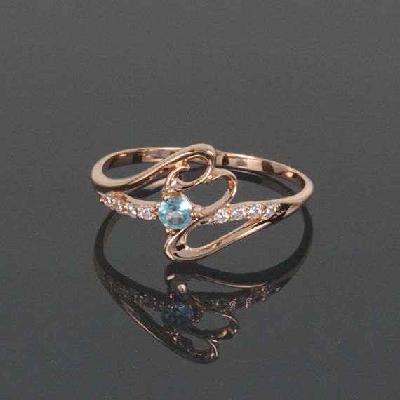 Кольцо из красного золота с топазом 20