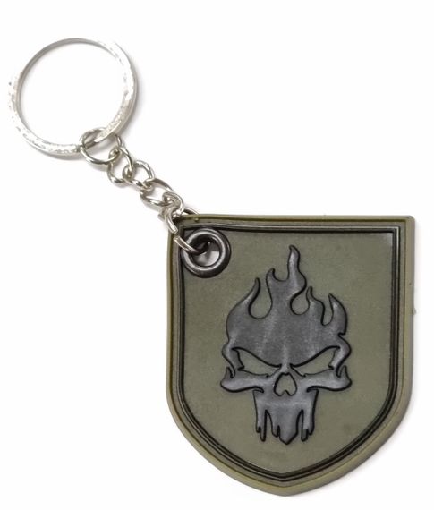 Брелок резиновый с кольцом  "Вогнений череп" хаки-черный