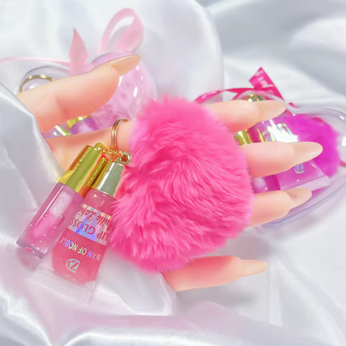 Набір блисків для губ 2-в-1 з хутряним брелоком GLITTER LIP GLOSS IMAN OF NOBLE