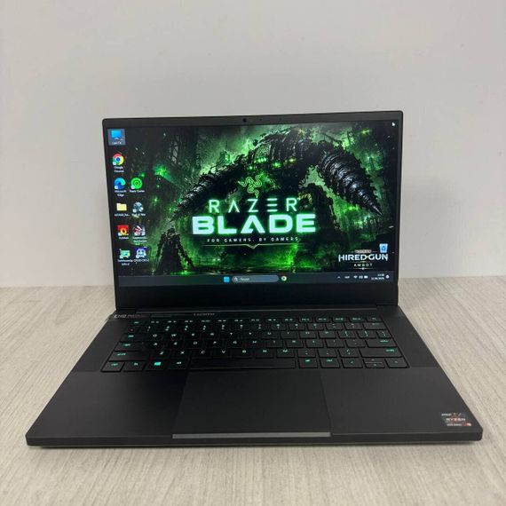 Ігровий ноутбук Б-клас Razer Blade 14 RZ09-0370 / 14" (1920x1080) IPS / AMD Ryzen 9 5900HX (8 (16) ядер по 3.3 - 4.6 GHz) / 16 GB DDR4 / 512 GB SSD / nVidia GeForce RTX 3060, 6 GB GDDR6, 192-bit / WebCam б/в | Зображення 1