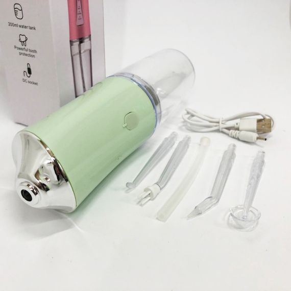 Іригатор для чищення зубів та порожнини рота Oral Irrigator з акумулятором та змінними насадками. Колір: зелений RP-47 | Зображення 4