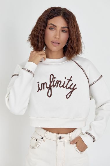 Короткий утепленный свитшот с вышитой надписью Infinity молочный цвет S | Зображення 4