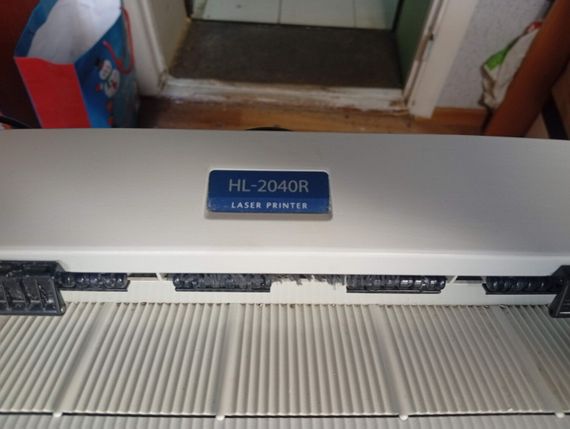 Принтер Б-класс Brother HL-2040R / Лазерная монохромная печать / 600x600 dpi / A4 / 20 стр/мин / USB 2.0, LPT б/у | Зображення 2