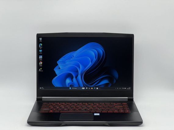 Игровой ноутбук Б-класс MSI GF63 8RD-222US / 15.6" (1920x1080) IPS / Intel Core i7-8750H (6 (12) ядер по 2.2 - 4.1 GHz) / 16 GB DDR4 / 480 GB SSD / nVidia GeForce GTX 1050 Ti MaxQ, 4 GB GDDR5, 128-bit / WebCam б/у + Подарок Беспроводная мышь HOCO GM28 | Зображення 1