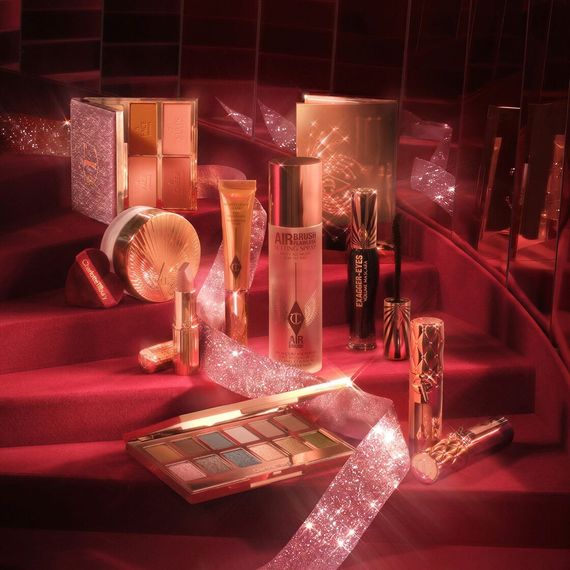 Подарочный набор Charlotte Tilbury Charlotte's Iconic Hollywood Beauty Secrets (тушь, спрей для фиксации макияжа, хайлайтер, блеск для увеличения объема губ) | Зображення 2