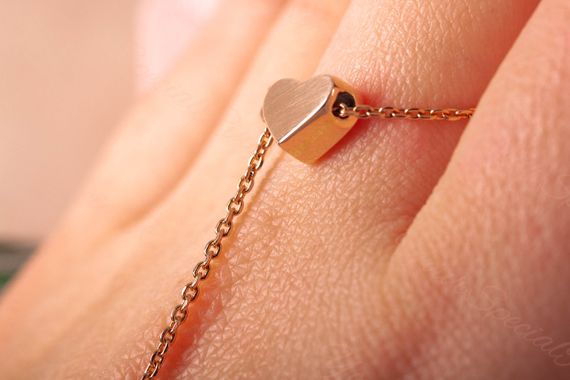 Кольцо из красного золота с цепочкой 16