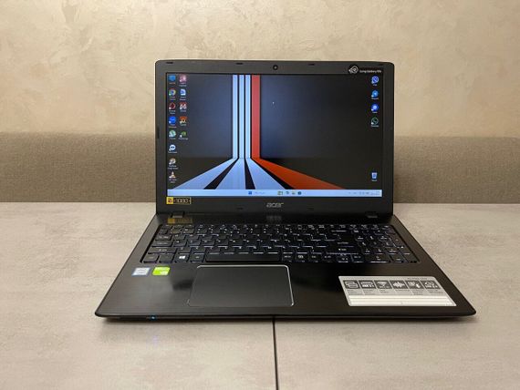 Ноутбук Б-класс Acer Aspire E5-576G-5762 / 15.6" (1920x1080) IPS / Intel Core i5-8250U (4 (8) ядра по 1.6 - 3.4 GHz) / 16 GB DDR3 / 240 GB SSD M.2 / nVidia GeForce MX150, 2 GB GDDR5, 64-bit / WebCam / DVD-ROM б/у | Зображення 1